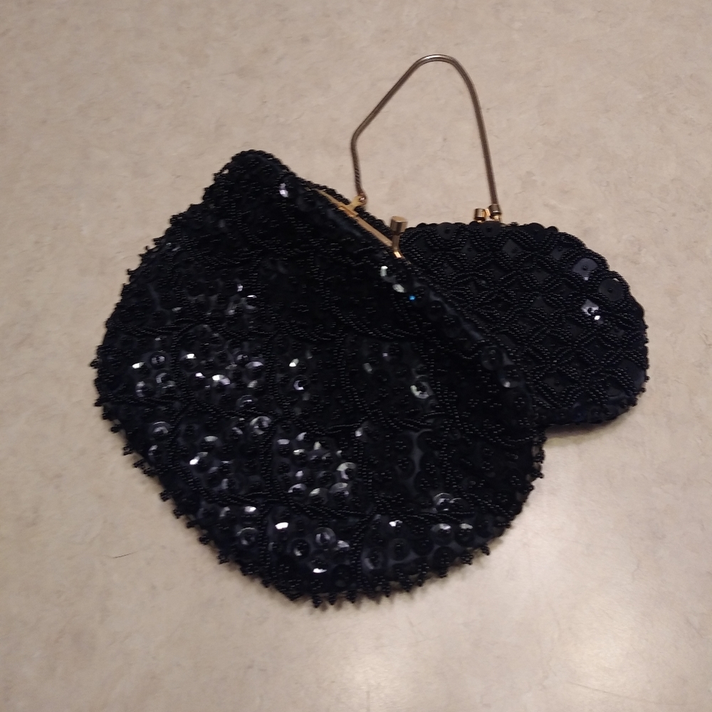Vintage beaded clutch in black, also selling with a matching  coin purse